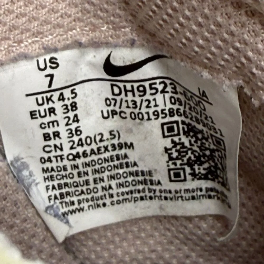 Nike Women's Pale Pink and White Athletic Sneakers